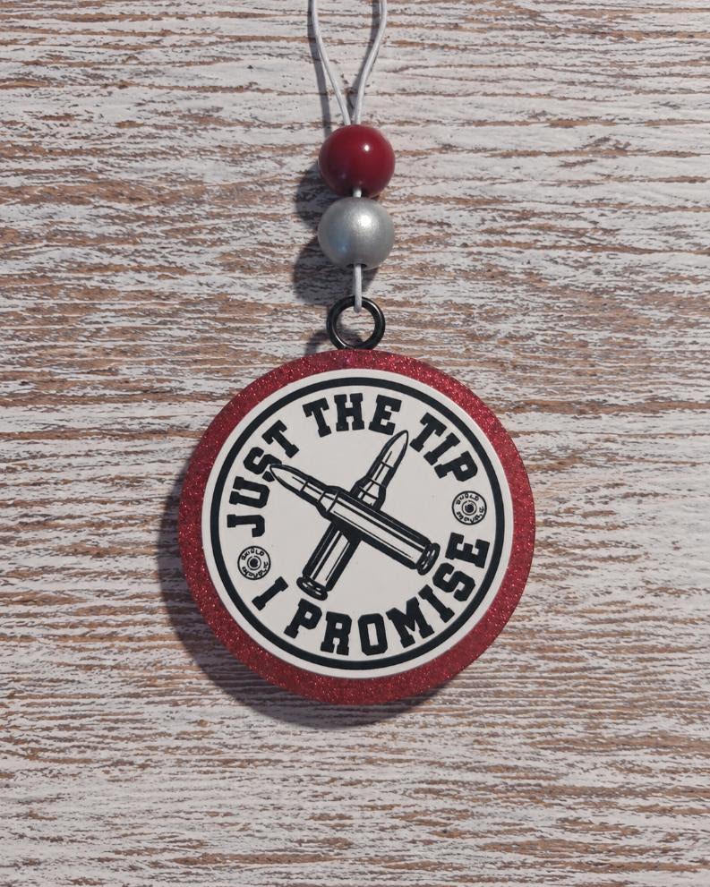 Just The Tip I Promise round cardstock freshie with bullet design and red glitter border