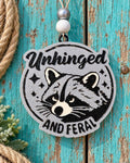 Unhinged and Feral raccoon car freshie in silver